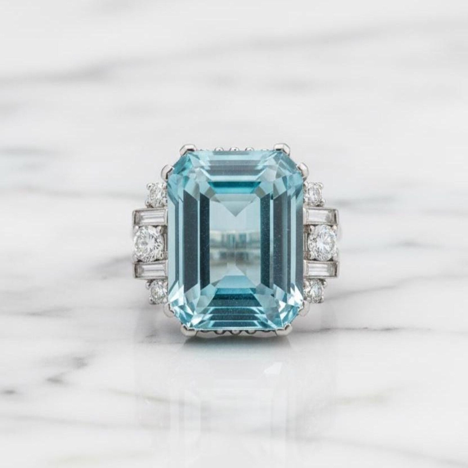 Natural Sky Blue Topaz 12×16 mm Emerald Cut Ring with Moissanite Accents – 925 Sterling Silver