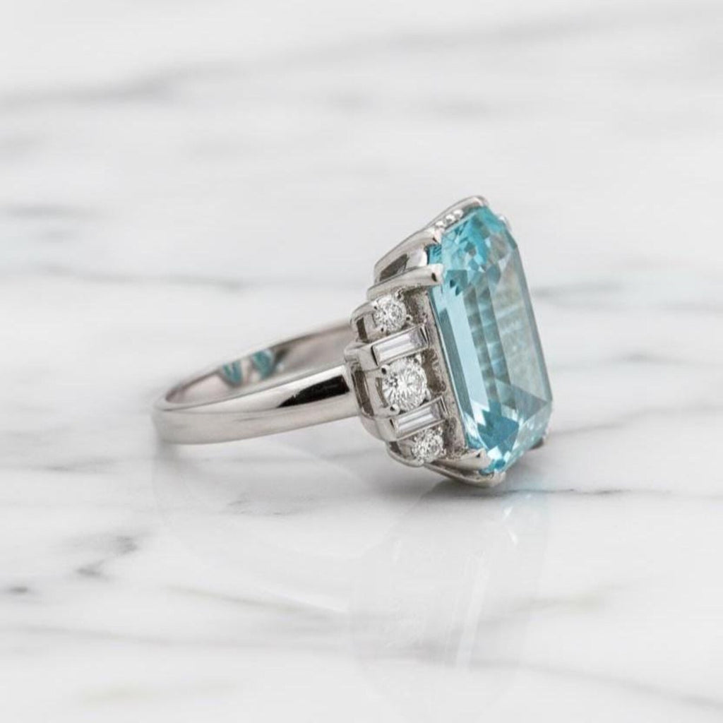 Natural Sky Blue Topaz 12×16 mm Emerald Cut Ring with Moissanite Accents – 925 Sterling Silver