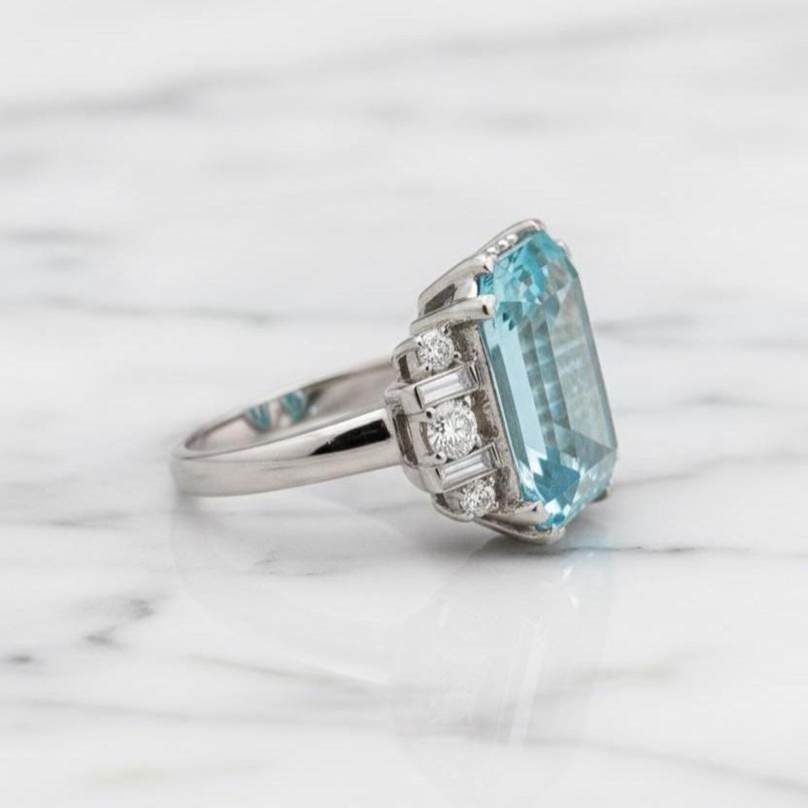 Natural Sky Blue Topaz 12×16 mm Emerald Cut Ring with Moissanite Accents – 925 Sterling Silver