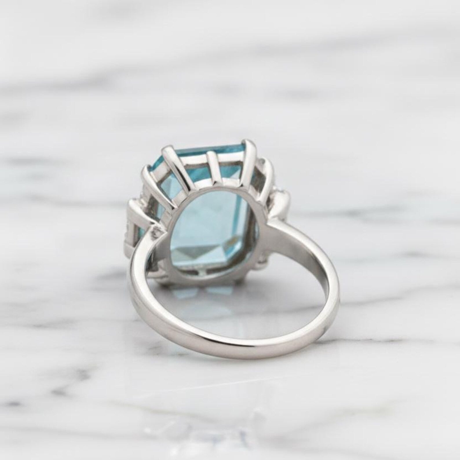 Natural Sky Blue Topaz 12×16 mm Emerald Cut Ring with Moissanite Accents – 925 Sterling Silver